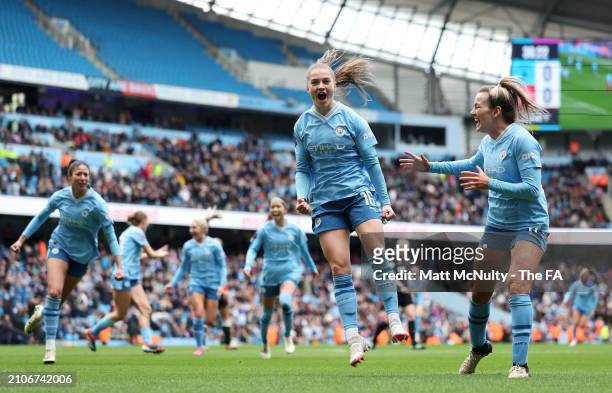 Jess Park of Manchester City celebrates scoring her team's first goal during the Barclays Women's Super League match between Manchester City and...