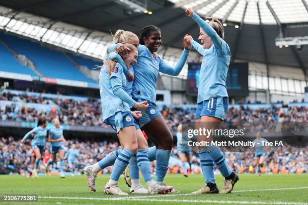 Jess Park of Manchester City celebrates scoring her team's second goal with teammates Alex Greenwood, Khadija Shaw and Lauren Hemp during the...