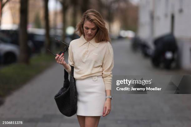 Viviane Geppert seen wearing Celine brown squared sunglasses, Miu Miu light yellow pastel polo sweater, Sandro creamy white tweed wool short skirt...
