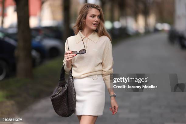 Viviane Geppert seen wearing Celine brown squared sunglasses, Miu Miu light yellow pastel polo sweater, Sandro creamy white tweed wool short skirt...