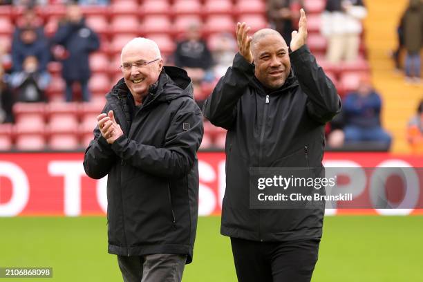 Sven-Goran Eriksson, Manager of Liverpool Legends, acknowledges the fans with John Barnes, prior to the LFC Foundation charity match between...