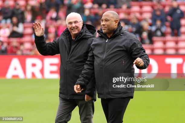 Sven-Goran Eriksson, Manager of Liverpool Legends, acknowledges the fans with John Barnes, prior to the LFC Foundation charity match between...