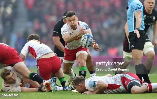 Danny Care of Harlequins passes the ball during the Gallagher Premiership Rugby match between Saracens and Harlequins at Tottenham Hotspur Stadium on...