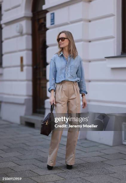 Marlies Pia Pfeifhofer seen wearing Vehla Eyewear brown sunglasses, gold necklace, Citizen of Humanity light blue denim blouse / buttoned shirt,...