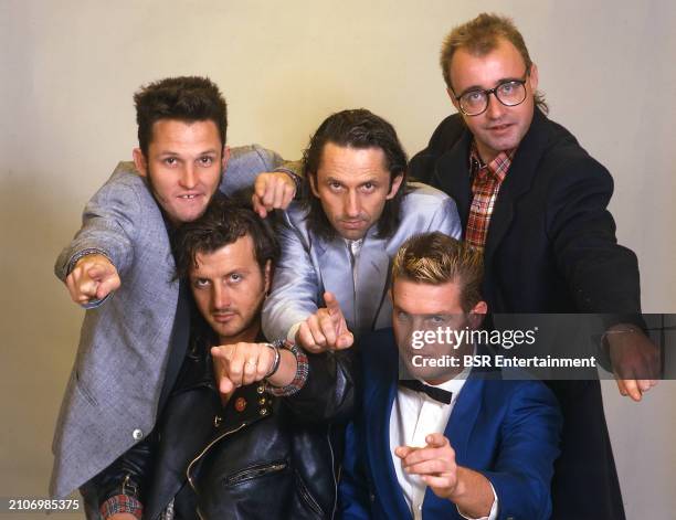 Australian rock group Mental As Anything members: Martin Plaza, Reg Mombassa , Andrew "Greedy" Smith, Peter O'Doherty, Wayne "Bird" De Lisle