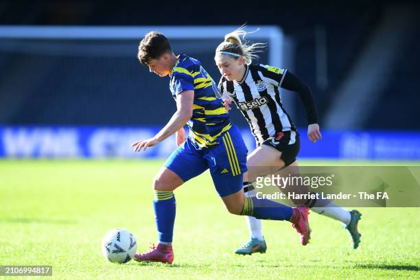 Valentine Pursey of Hashtag United runs with the ball whilst under pressure from Tyler Dodds of Newcastle United during the FA Women's National...