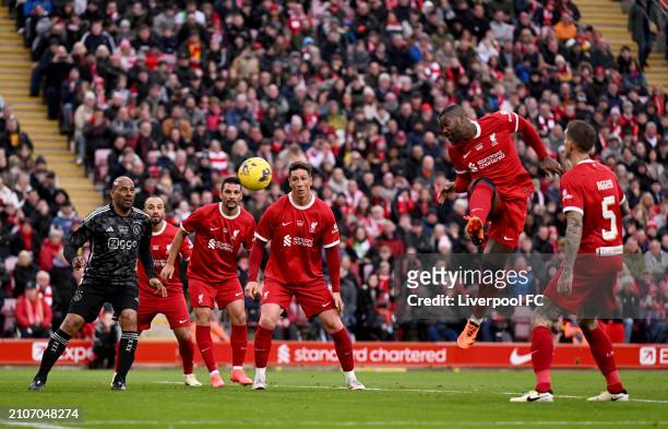 Djibril Cisse scoring the second goal making the score 2-2 during the LFC Foundation charity match between Liverpool FC Legends and AFC Ajax Legends...