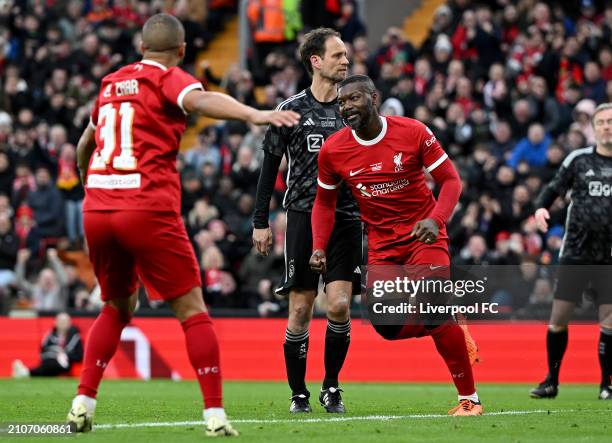 Djibril Cisse of Liverpool celebrates scoring liverpool's second goal during the LFC Foundation charity match between Liverpool FC Legends and AFC...