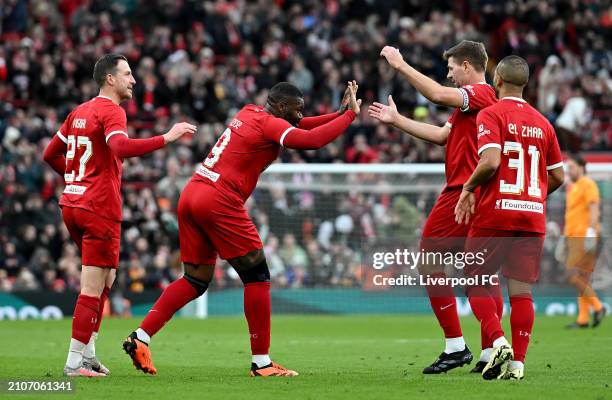 Djibril Cisse of Liverpool celebrates scoring liverpool's second goal during the LFC Foundation charity match between Liverpool FC Legends and AFC...