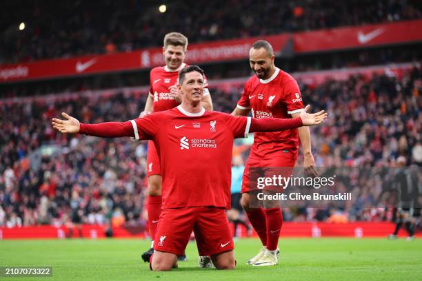 Fernando Torres of Liverpool Legends celebrates scoring his team's fourth goal during the LFC Foundation charity match between Liverpool FC Legends...