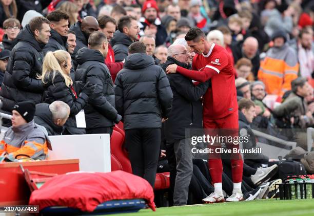 Fernando Torres embraces Sven-Goran Eriksson, Manager of Liverpool Legends, after being substituted off during the LFC Foundation charity match...