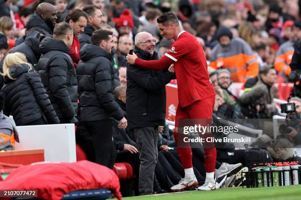 Fernando Torres embraces Sven-Goran Eriksson, Manager of Liverpool Legends, after being substituted off during the LFC Foundation charity match...