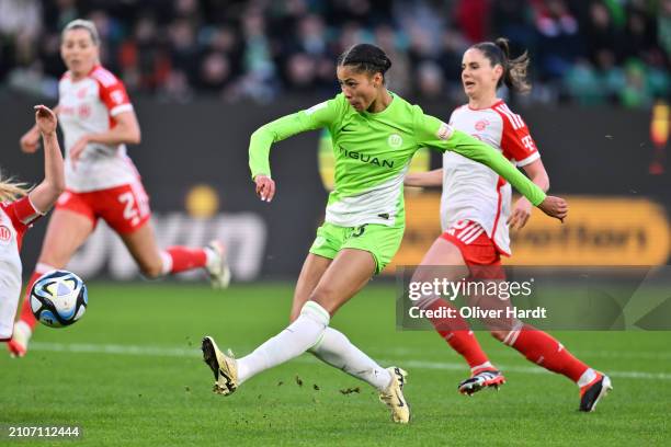 Sveindis Jane Jonsdottir of VfL Wolfsburg competes for the ball with Sarah Zadrazil of FC Bayern München during the Google Pixel Women's Bundesliga...