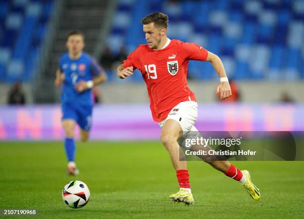 Christoph Baumgartner of Austria runs with the ball during the international friendly match between Slovakia and Austria at National Football stadium...