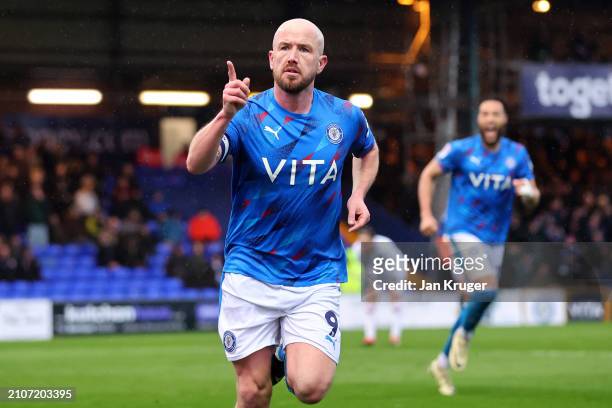 Paddy Madden of Stockport County celebrates scoring his teams second goal during the Sky Bet League Two match between Stockport County and Milton...