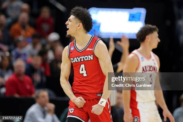 Koby Brea of the Dayton Flyers celebrates during the first half against the Arizona Wildcats in the second round of the NCAA Men's Basketball...