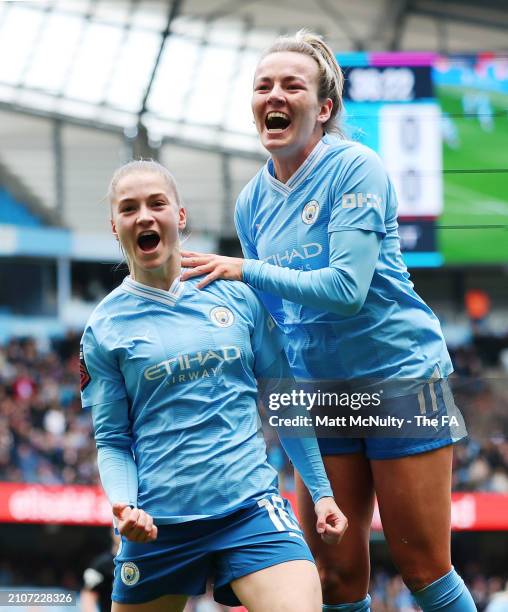 Jess Park of Manchester City celebrates with teammate Lauren Hemp after scoring her team's first goal during the Barclays Women´s Super League match...