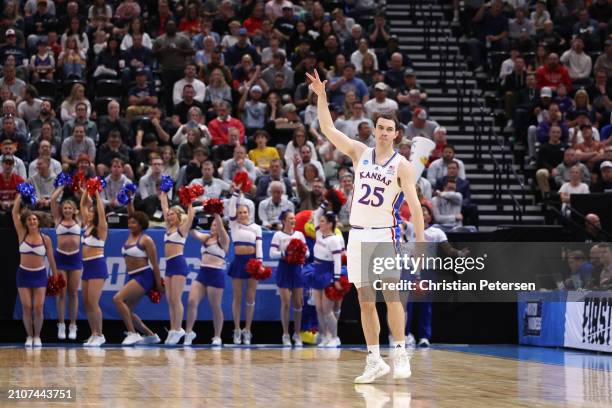 Nicolas Timberlake of the Kansas Jayhawks celebrates after a basket against the Gonzaga Bulldogs during the first half in the second round of the...