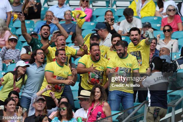Fans of Thiago Seyboth Wild of Brazil cheer during the match against Taylor Fritz on day 8 of the Miami Open at Hard Rock Stadium on March 23, 2024...