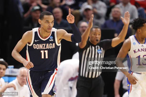 Nolan Hickman of the Gonzaga Bulldogs celebrates during the first half against the Kansas Jayhawksin the second round of the NCAA Men's Basketball...