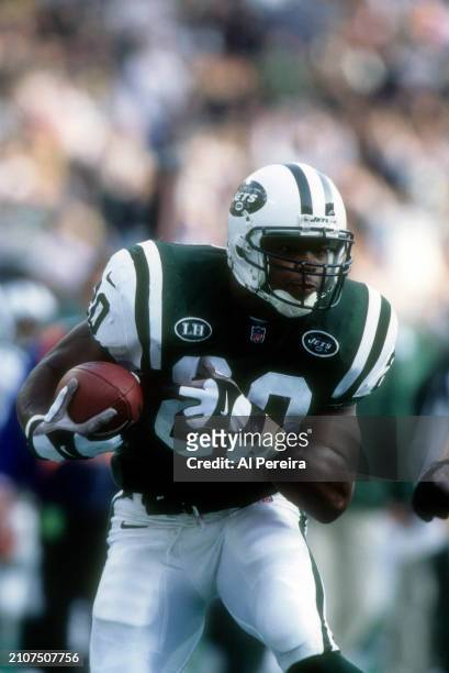 Running Back Richie Anderson of the New York Jets has a long gain in the game between the Seattle Seahawks vs the New York Jets on January 2, 2000 at...