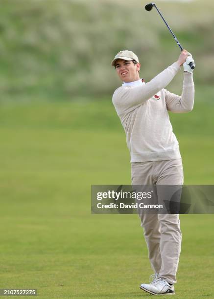 Enrique De Guzman Ochoa of Cambridge plays his second shot on the 16th hole in the morning round of his singles match against Dr Chris Little of...