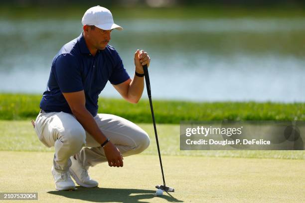 Scott Stallings of the United States lines up a putt on the 13th green during the third round of the Valspar Championship at Copperhead Course at...