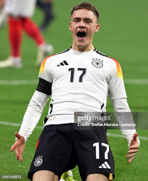 Florian Wirtz of Germany celebrates as he scores the goal 0:1 during the international friendly match between France and Germany at Groupama Stadium...