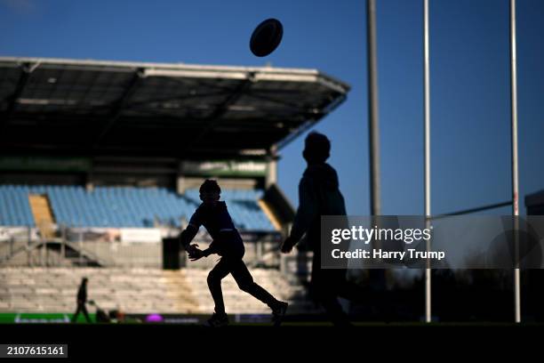 Young spectators play on the pitch following the Gallagher Premiership Rugby match between Exeter Chiefs and Newcastle Falcons at Sandy Park on March...