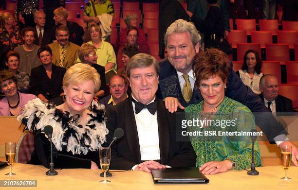 Presenter Ernst Daniel Smid is seen with jury members Wilma Driessen, Ruud van der Meer, Marjolein Touw are seen on set during an episode of the...