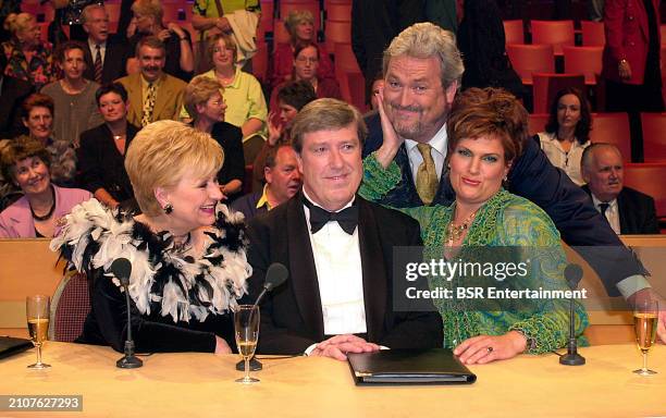 Presenter Ernst Daniel Smid is seen with jury members Wilma Driessen, Ruud van der Meer, Marjolein Touw are seen on set during an episode of the...