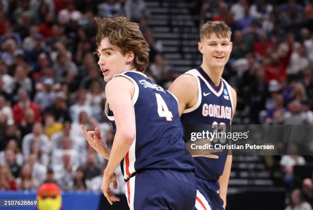 Dusty Stromer and Ben Gregg of the Gonzaga Bulldogs celebrate during the second half against the Kansas Jayhawks in the second round of the NCAA...