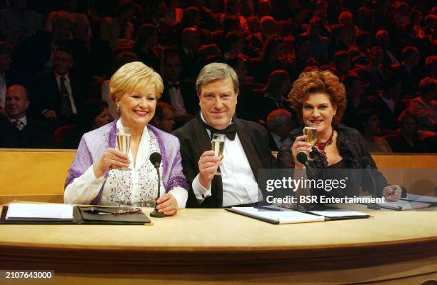 Jury members Wilma Driessen, Ruud van der Meer and Marjolein Touw are seen during an episode of the Dutch TROS TV opera contest show Una Voce...