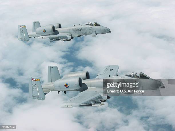 Two Maryland Air National Guard 175th Fighter Wing A-10s fly side by side June 13, 2003.