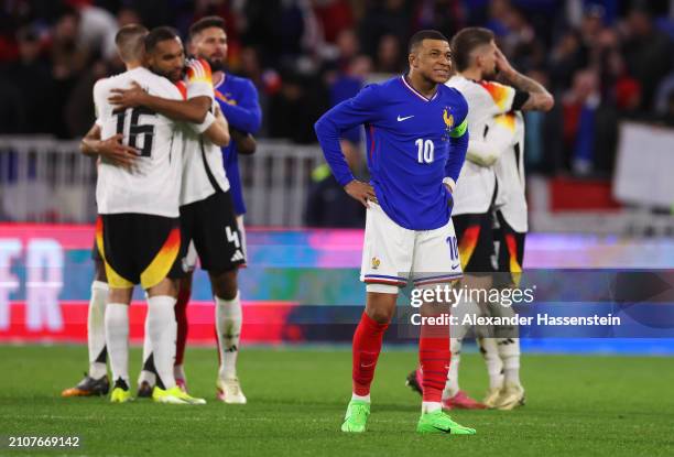 Kylian Mbappe of France looks dejected after the team's defeat during the international friendly match between France and Germany at Groupama Stadium...