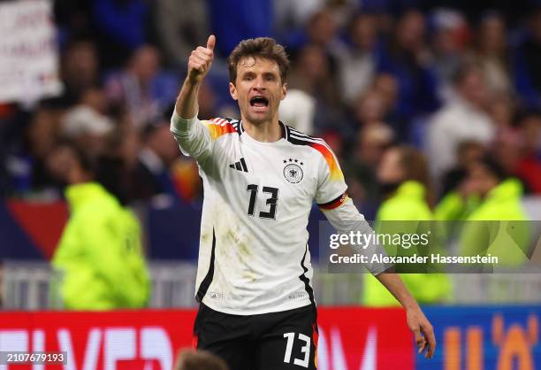 Thomas Mueller of Germany reacts during the international friendly match between France and Germany at Groupama Stadium on March 23, 2024 in Lyon,...