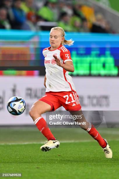 Pernille Harder of FC Bayern München runs with the ball during the Google Pixel Women's Bundesliga match between VfL Wolfsburg and FC Bayern München...