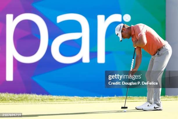 Lucas Glover of the United States putts on the 18th green during the third round of the Valspar Championship at Copperhead Course at Innisbrook...