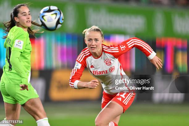 Lea Schueller of FC Bayern München runs with the ball during the Google Pixel Women's Bundesliga match between VfL Wolfsburg and FC Bayern München at...