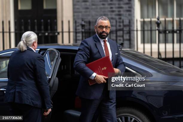 James Cleverly, Britain's Home Secretary, arrives to attend the weekly meeting of Cabinet ministers in 10, Downing Street on March 26, 2024 in...