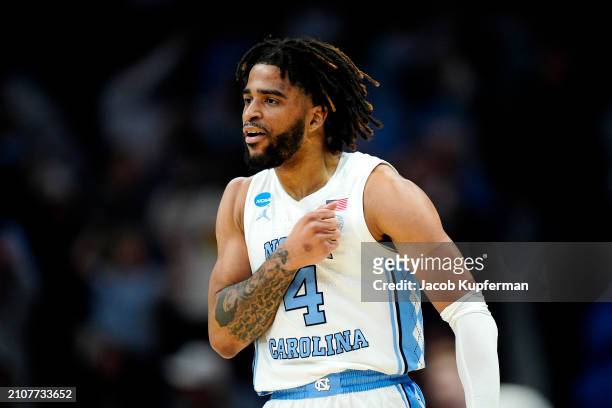 Davis of the North Carolina Tar Heels celebrates a three-point basket during the first half against the Michigan State Spartans in the second round...