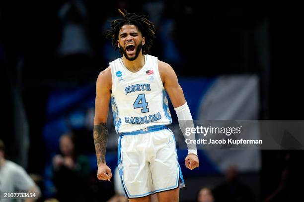 Davis of the North Carolina Tar Heels celebrates a three-point basket during the first half against the Michigan State Spartans in the second round...