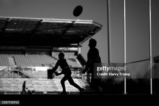 Young spectators play on the pitch following the Gallagher Premiership Rugby match between Exeter Chiefs and Newcastle Falcons at Sandy Park on March...