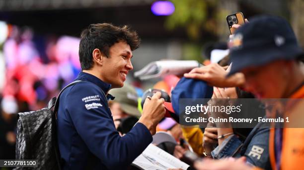 Alexander Albon of Thailand driving the Williams FW46 Mercedes greets fans on the Melbourne Walk prior to the F1 Grand Prix of Australia at Albert...