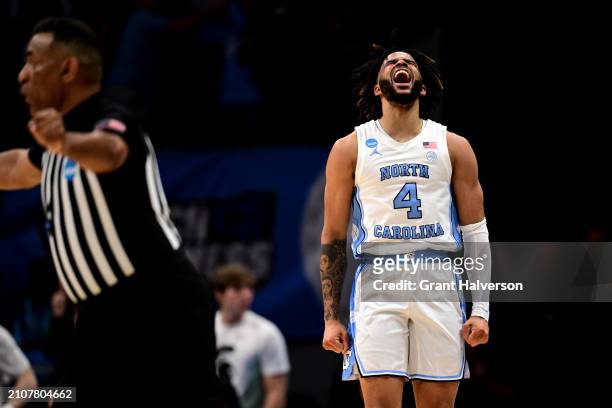 Davis of the North Carolina Tar Heels reacts during the first half of the second round of the NCAA Men's Basketball Tournament against the Michigan...