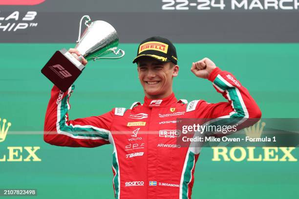 Race winner Dino Beganovic of Sweden and PREMA Racing celebrates on the podium during the Round 2 Melbourne Feature race of the Formula 3...