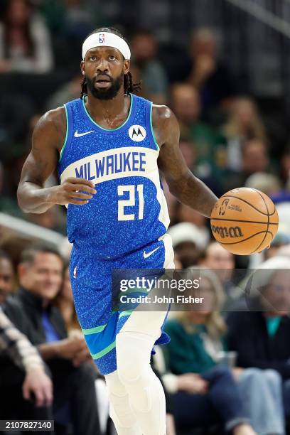 Patrick Beverley of the Milwaukee Bucks dribbles up court during the first half of the game against the Brooklyn Nets at Fiserv Forum on March 21,...