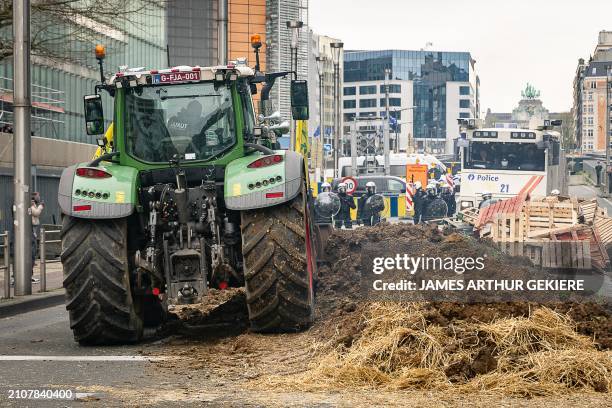Farmers take their tractors to the streets for a protest action of farmers' confederation European Coordination Via Campesina , organized in response...