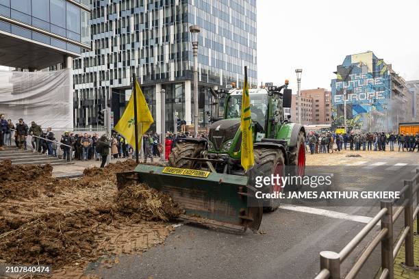 Farmers take their tractors to the streets for a protest action of farmers' confederation European Coordination Via Campesina , organized in response...