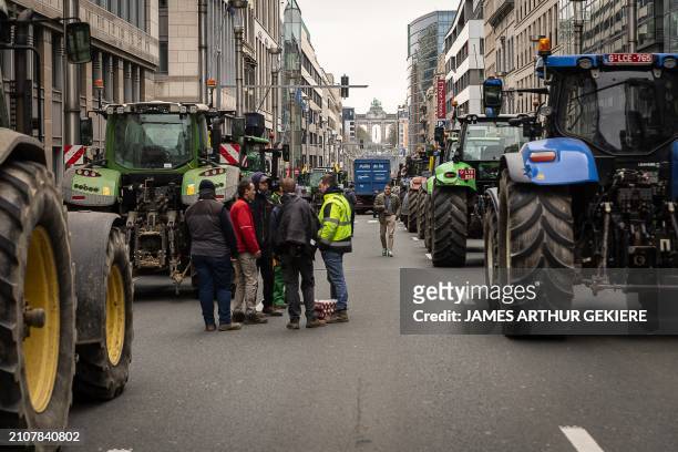 Farmers take their tractors to the streets for a protest action of farmers' confederation European Coordination Via Campesina , organized in response...